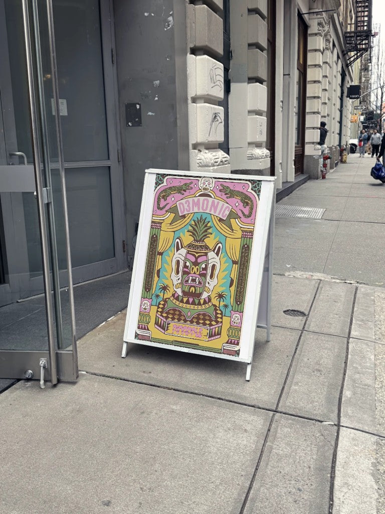 Vintage pineapple poster on street display board.